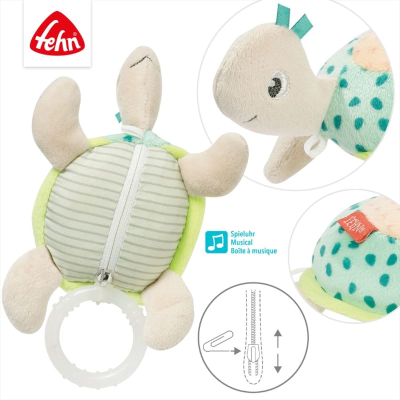 Fehn Mini Musical Turtle back view showing safety zipper for removable wind-up musical mechanism — close-ups of embroidered face, teal ribbon tags and teal spotted shells Fehn Mini Musical Turtle