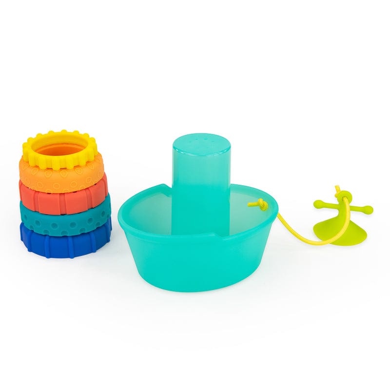 Stacked rings shown beside the empty turquoise boat and small bath toy piece