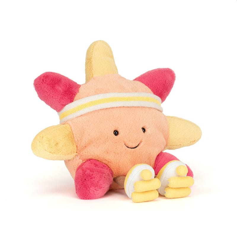 Jellycat Amuseables Sun Roller Skates front view — peach plush sun with yellow and hot pink rays, yellow and white striped headband, embroidered smiling face and yellow roller skates"