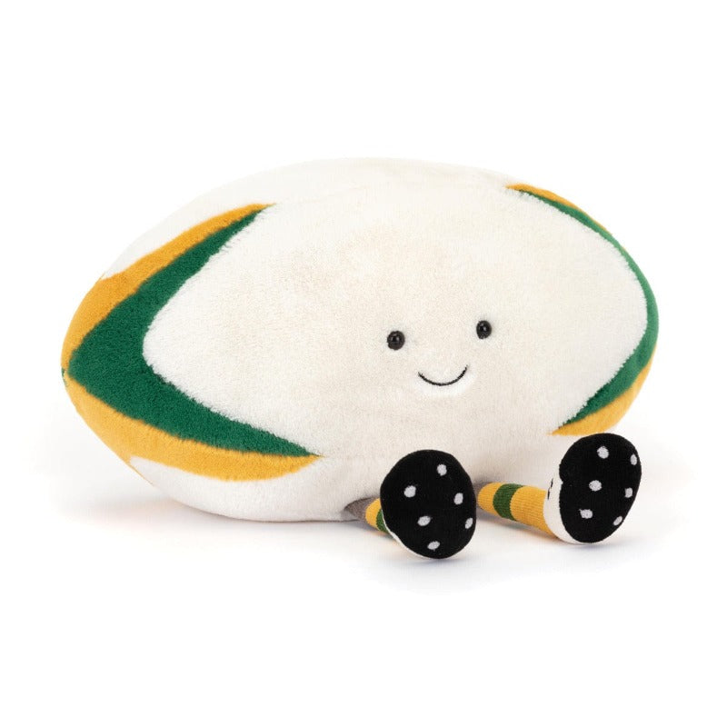 Jellycat Amuseable Sports Australian Rugby Ball angled front view — white plush rugby ball with green and gold stripe panels, embroidered smiling face and green and gold striped rugby socks with black studded boots