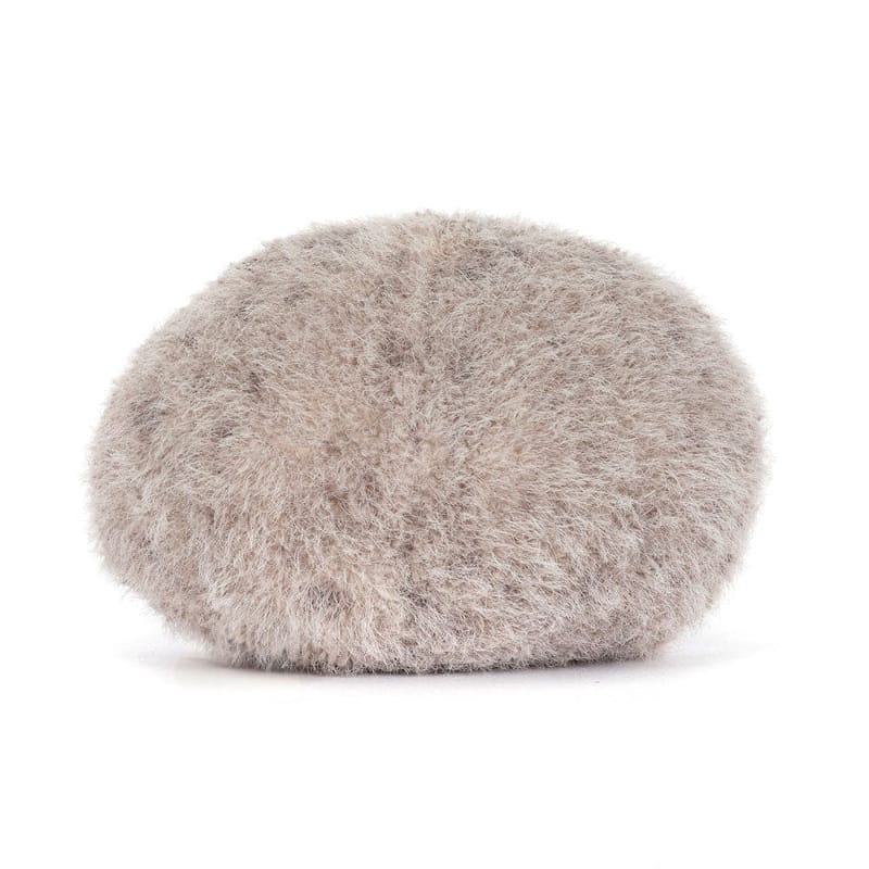 Jellycat Amuseables Pebble back view — oval grey plush pebble with fluffy textured fur, showing smooth rounded back with no face or feet visible