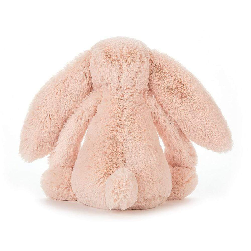 Jellycat Bashful Blush Bunny Medium back view — soft blush pink plush bunny with long floppy ears spread wide, fluffy textured fur with golden highlights and small round tail