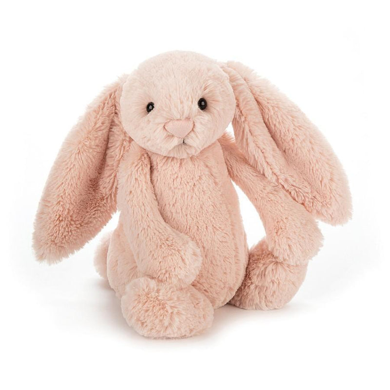 Jellycat Bashful Blush Bunny Medium front view — soft blush pink plush bunny with long floppy ears, embroidered pink nose, black bead eyes and fluffy textured fur, sitting soft toy